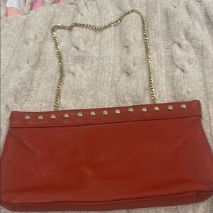Elegant Red Leather Bag with Gold Chain